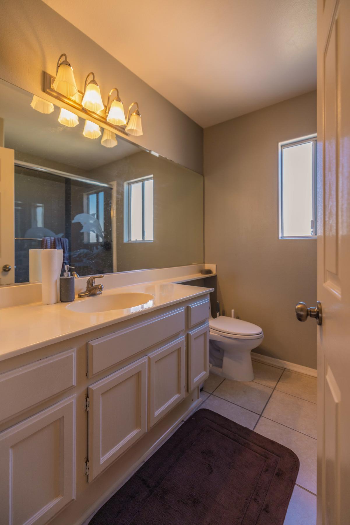 One of three full bathrooms